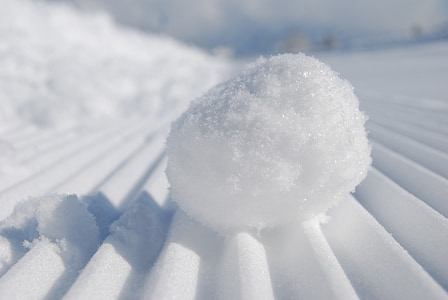 closeup photo of snow ball on corrugated galvanize sheet thumbnail