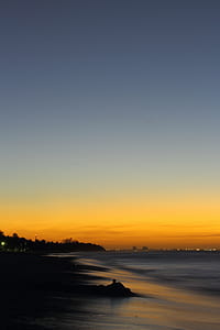 body of water under orange sunset thumbnail