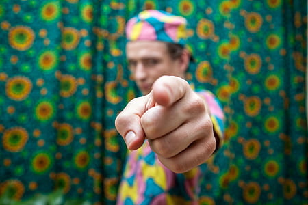 man pointing on camera thumbnail