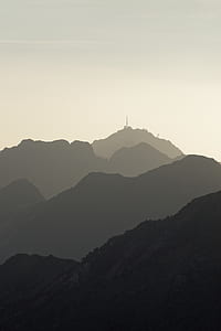 silhouette of mountains during daytime photography thumbnail
