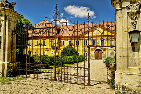 photo of opened brown metal gate thumbnail