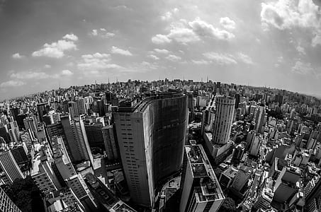 High Angle View of Cityscape Against Cloudy Sky thumbnail