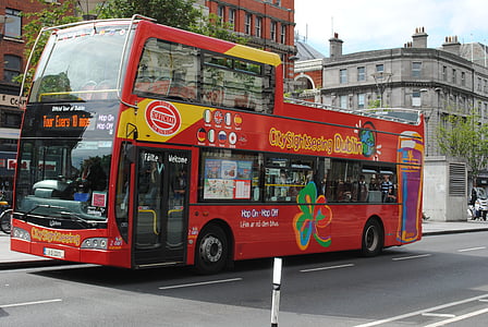 red and yellow double-decker bus on road thumbnail