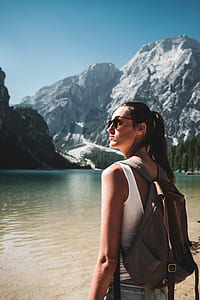 woman standing in front of lake thumbnail