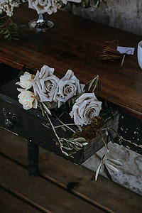 white roses in wooden drawer thumbnail