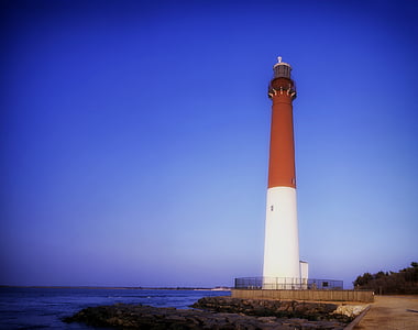 brown and white lighthouse thumbnail