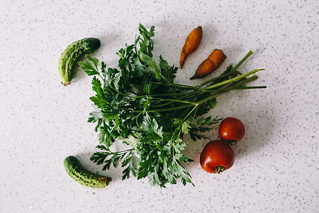 Parslel, cucumbers, green peas, and other greenery thumbnail