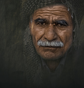 man wearing gray and black head accessory on near gray background thumbnail