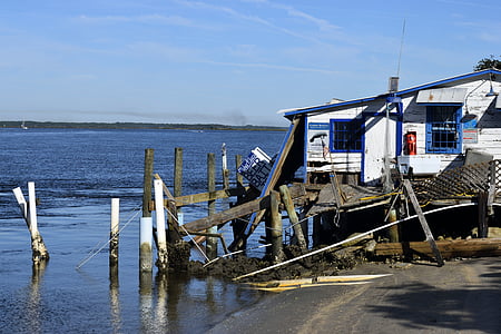 white house beside sea thumbnail