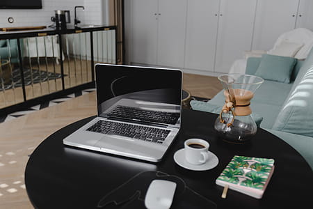 Workplace with laptop on table at home thumbnail