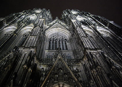 Low Angle Photography of Gray Concrete Cathedral at Nighttime thumbnail