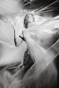 grayscale photo of woman thumbnail