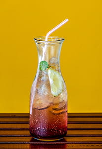 Clear Glass Pitcher Filled With Juice thumbnail