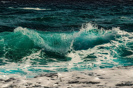 crashing seashore during daytime thumbnail