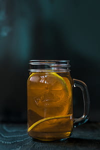 filled clear glass mug with lime juice thumbnail