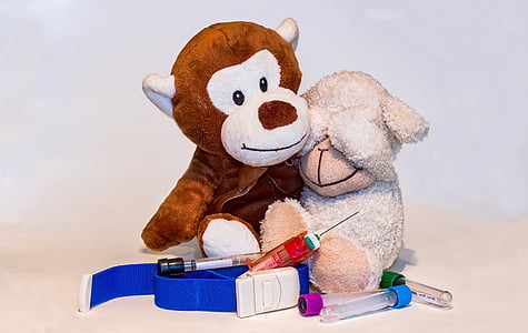 gray sheep and brown primate plush toys on white background thumbnail