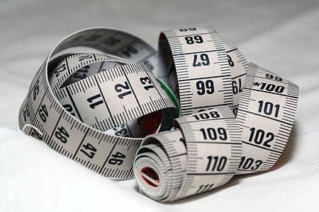 closeup photo of tape measure thumbnail